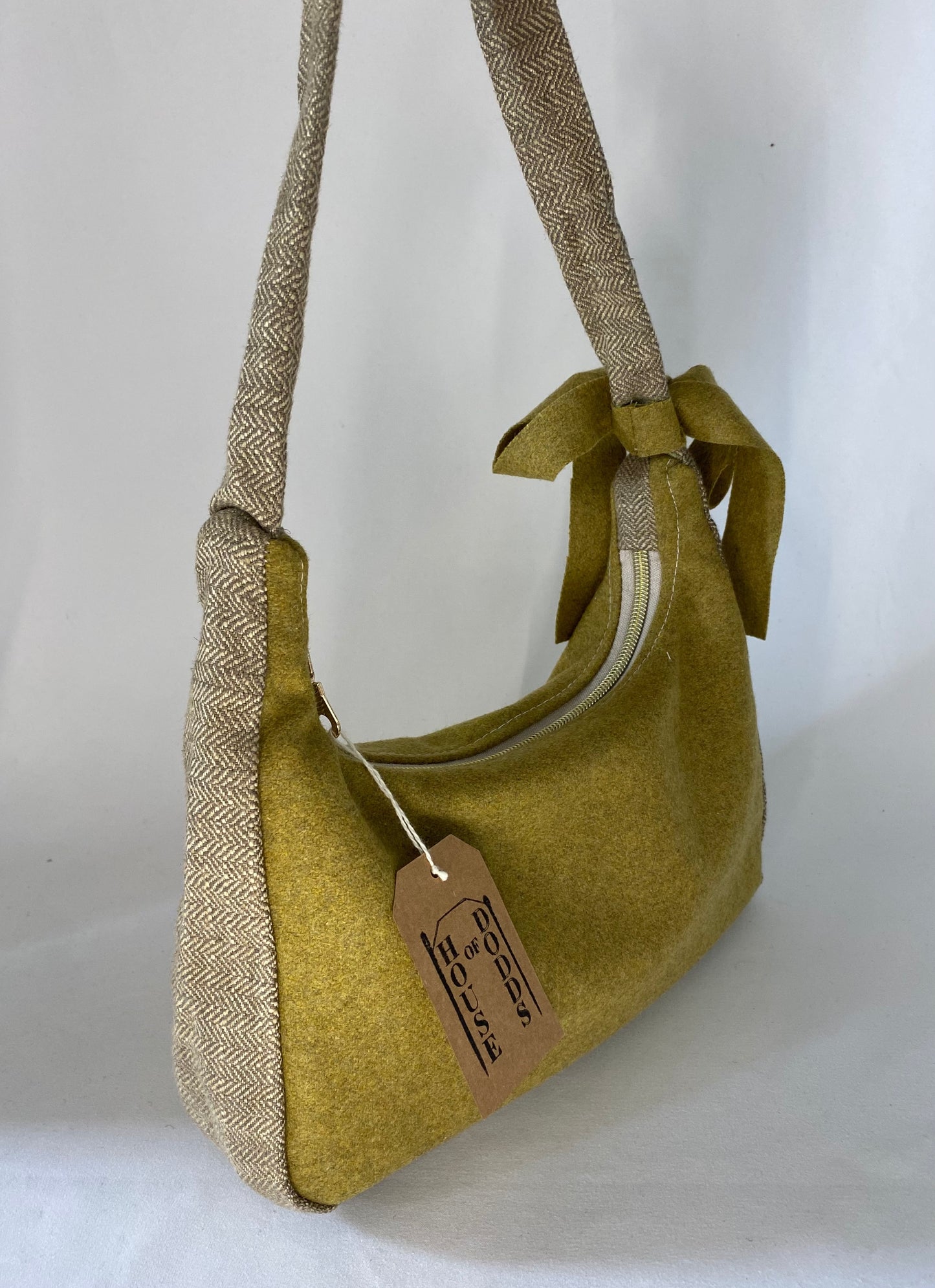 Green bag with herringbone details