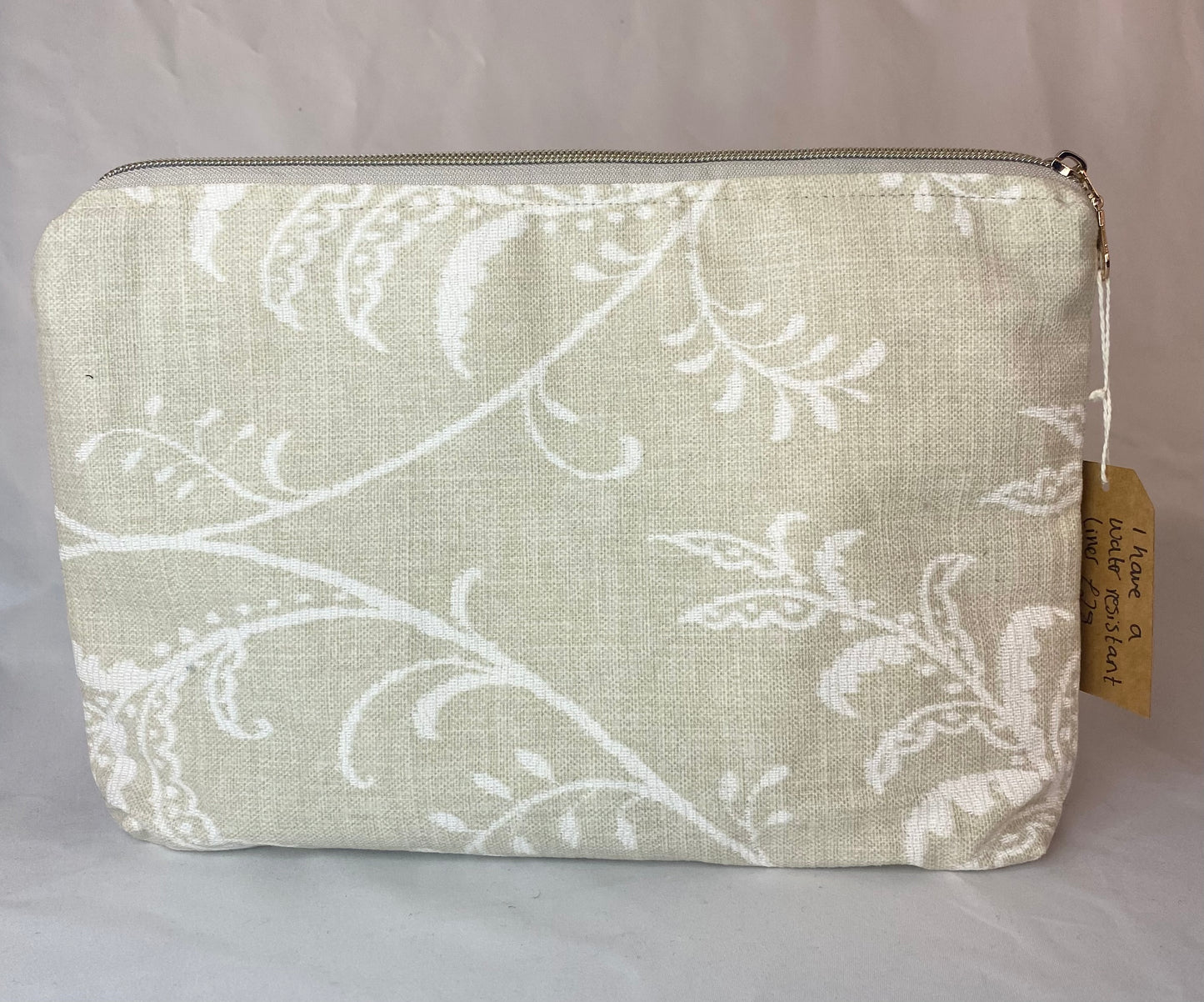 Neutral textured Cosmetic bag with water resistant lining