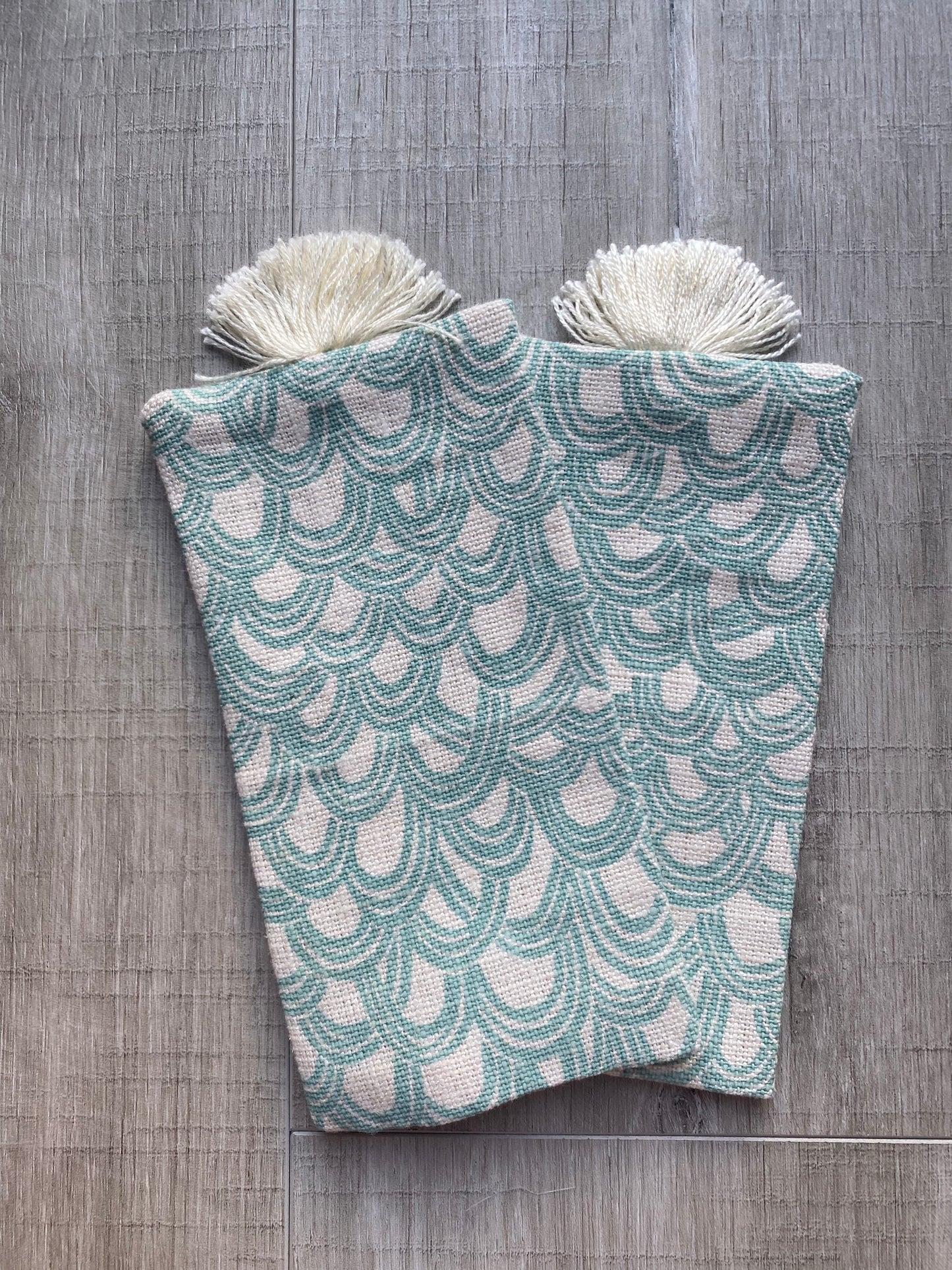 hand made book mark boho vibes cotton fabric with decretive tassel. small bookmark perfect for use in Children's books as its small and wide. reusable and zero waste