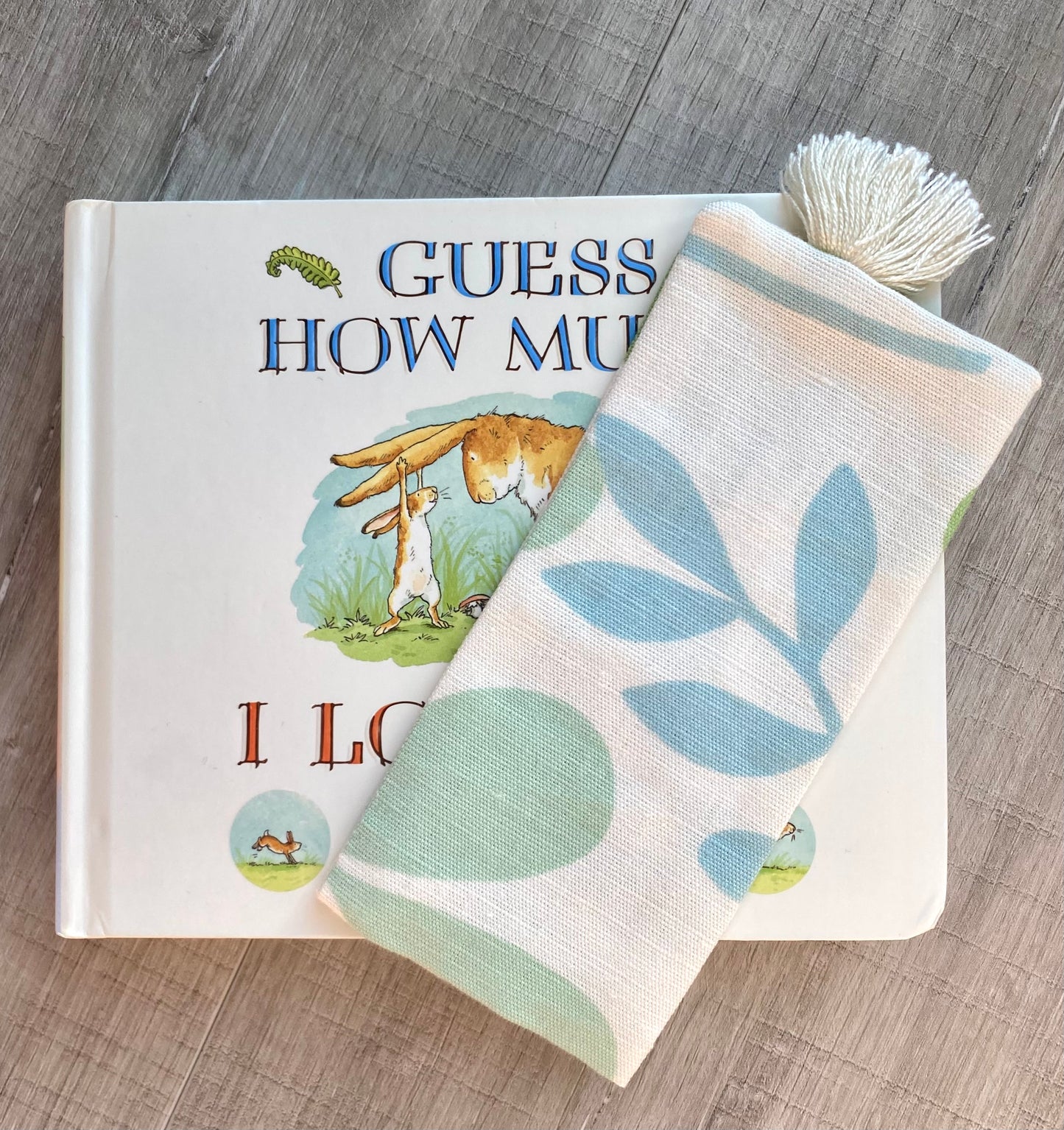 "Handmade fabric bookmark with floral design, 3x6.5 inches, upcycled from designer fabric"and made book marks playful pattered cotton fabric with decretive tassel. small bookmark perfect for use in Children's books as its small and wide. reusable and zero waste
