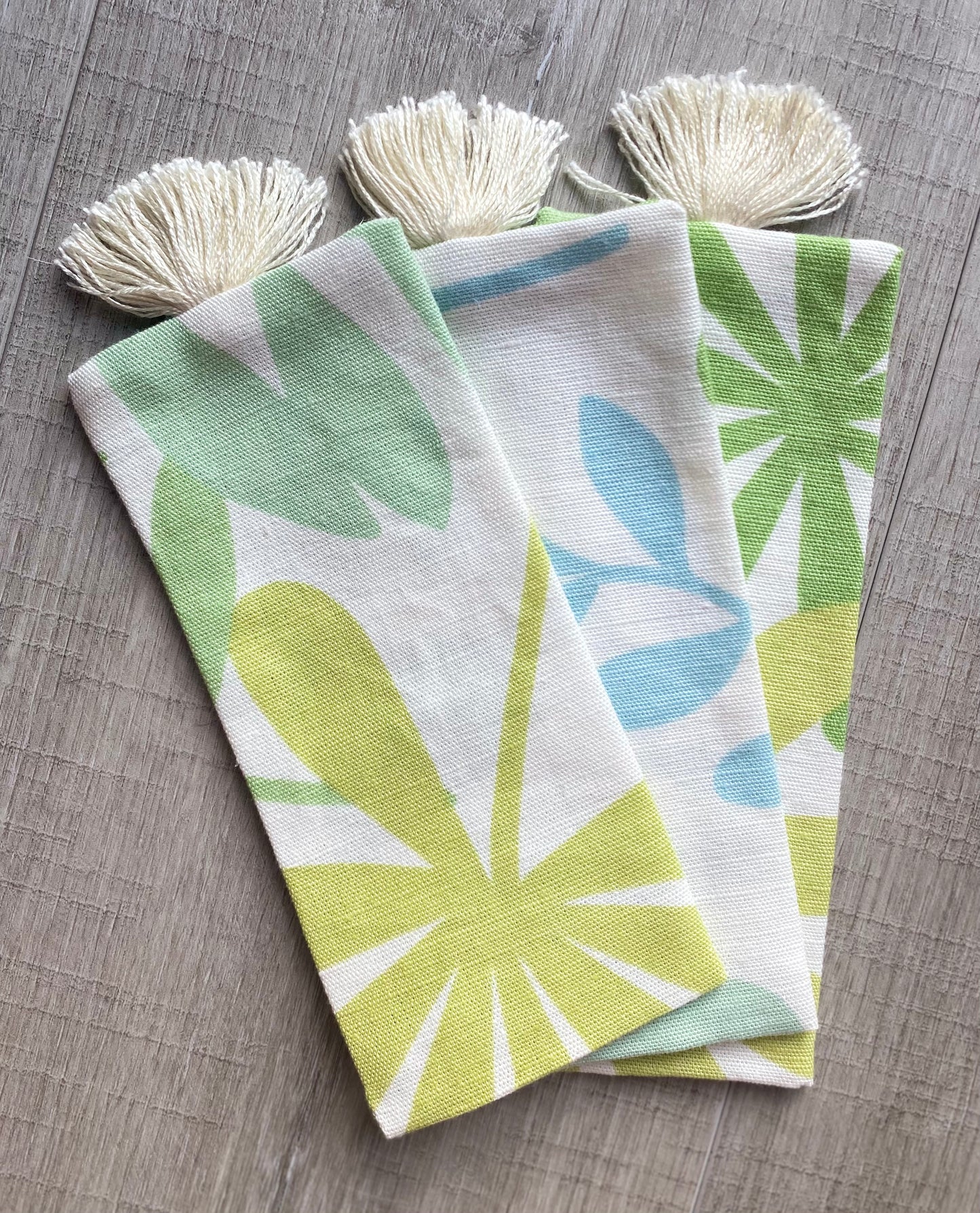 hand made book marks playful pattered cotton fabric with decretive tassel. small bookmark perfect for use in Children's books as its small and wide. reusable and zero waste