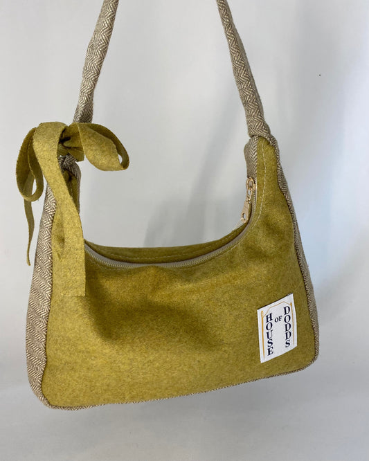 Green bag with herringbone details