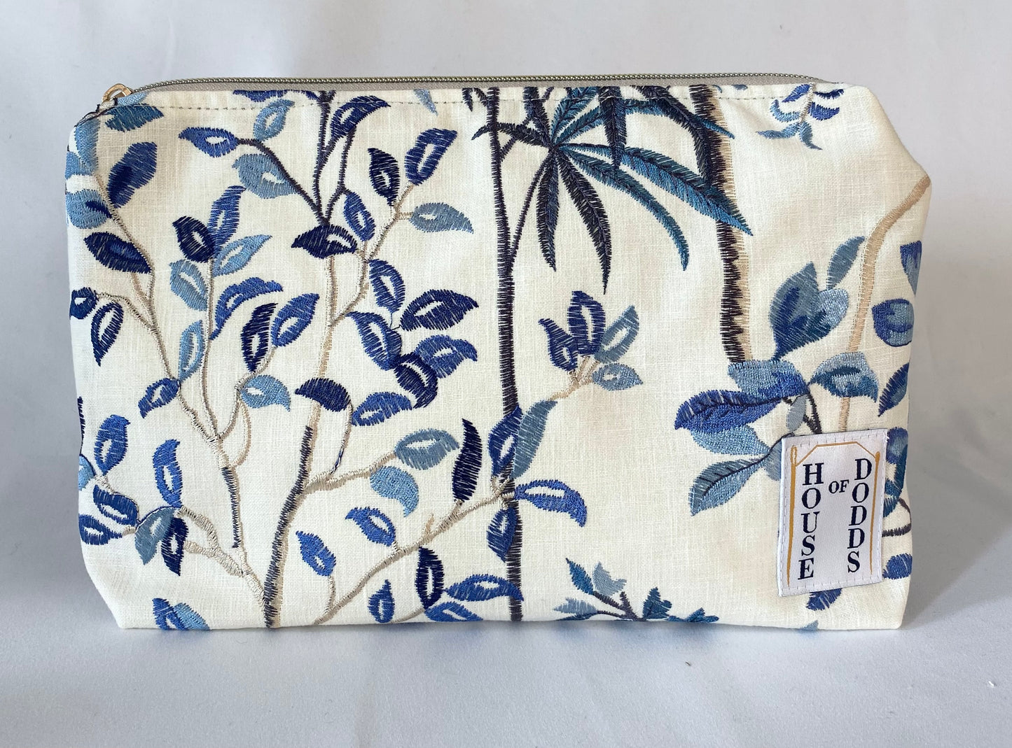 Blue Floral Embroidered Cosmetic bag with water resistant lining