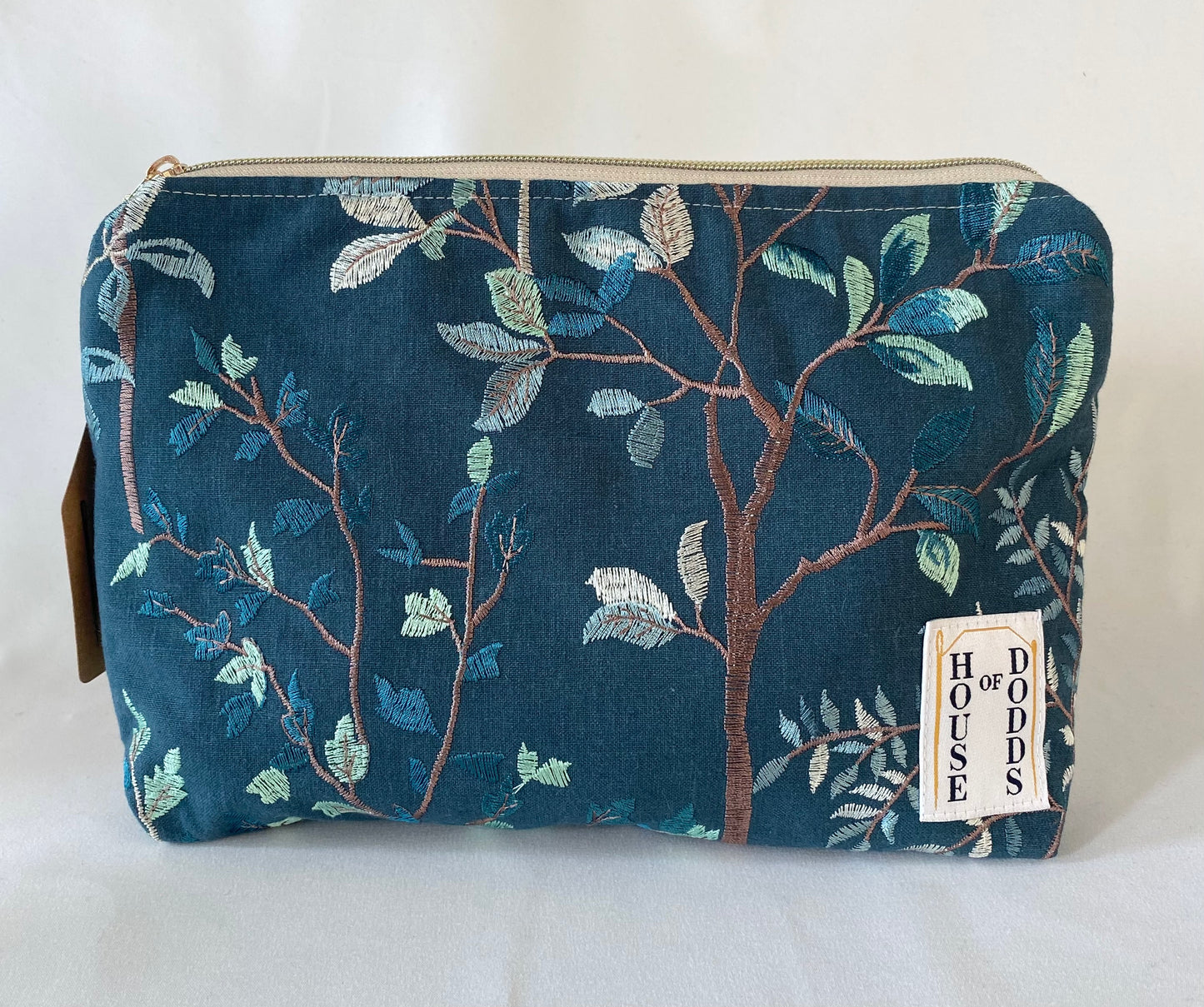 Turquoise embroidered Cosmetic bag with water resistant lining