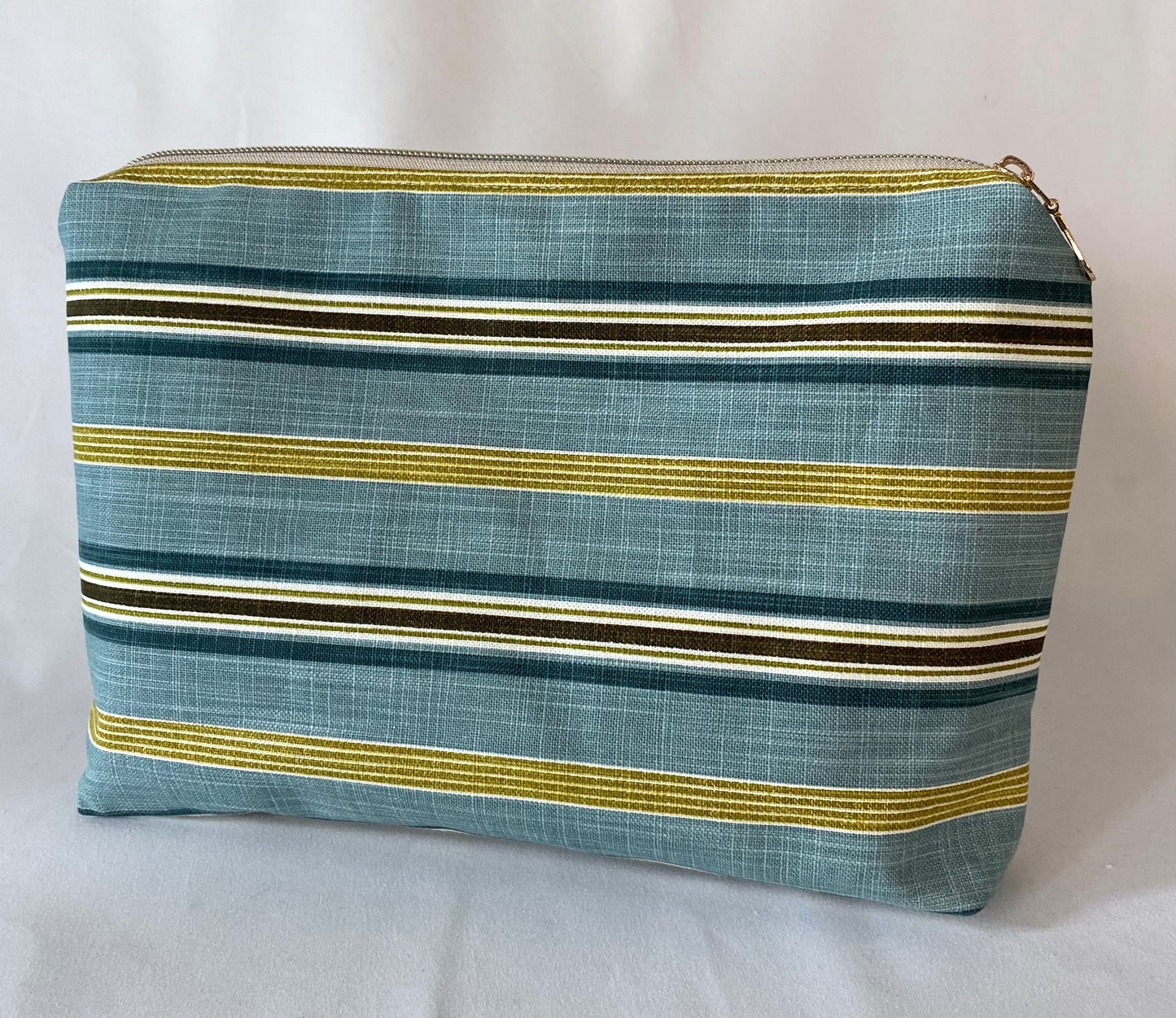 Turquoise floral and striped Cosmetic bag with water resistant lining