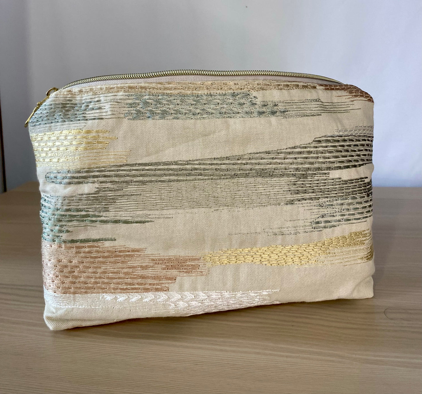 Gold Textured Cosmetic bag